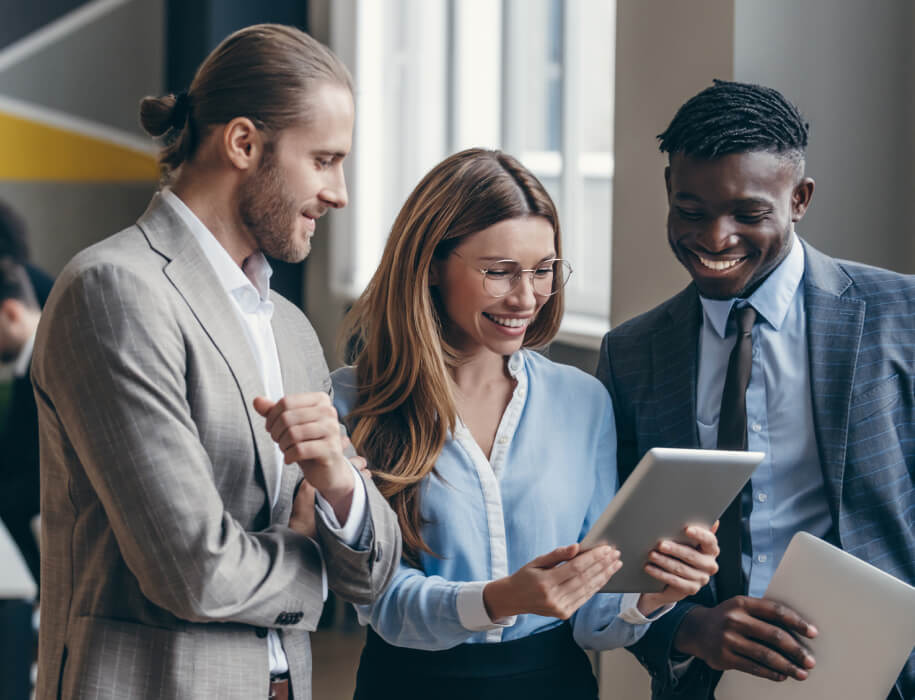 young business people looking at a tablet