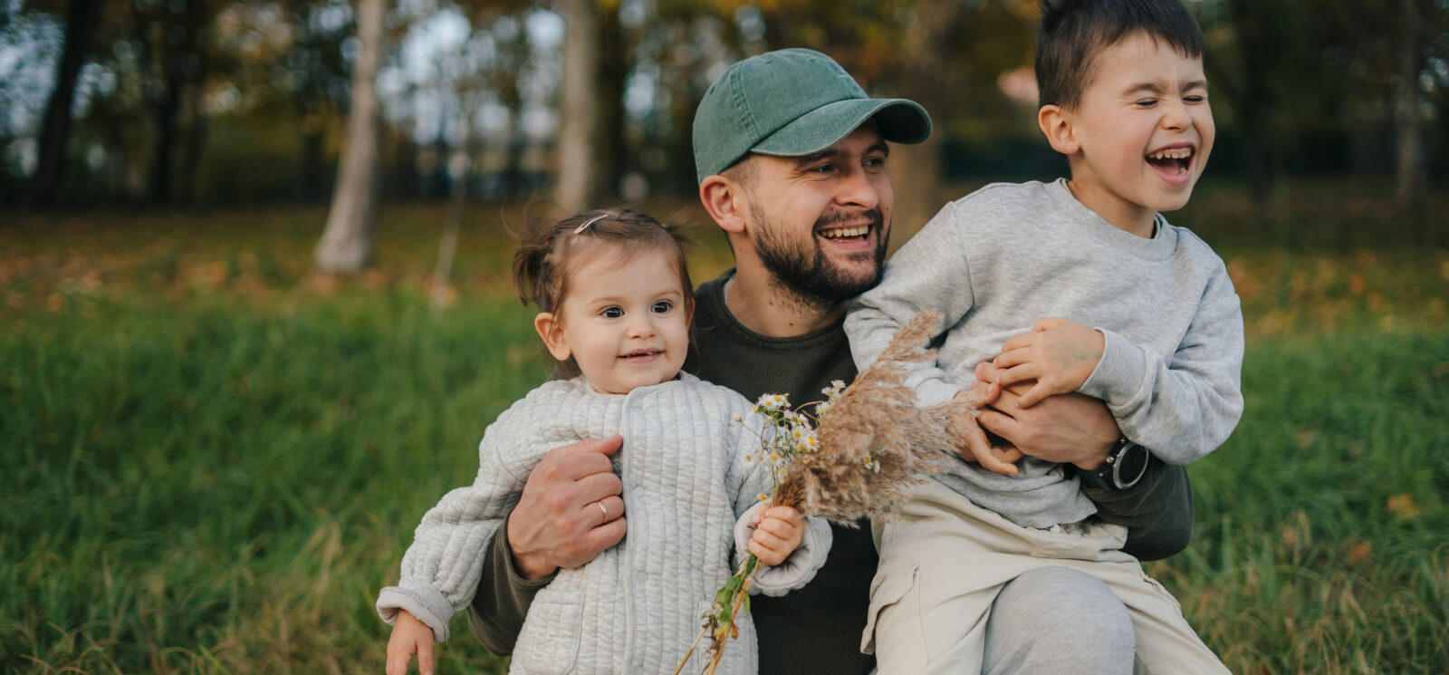 Young family playing outside