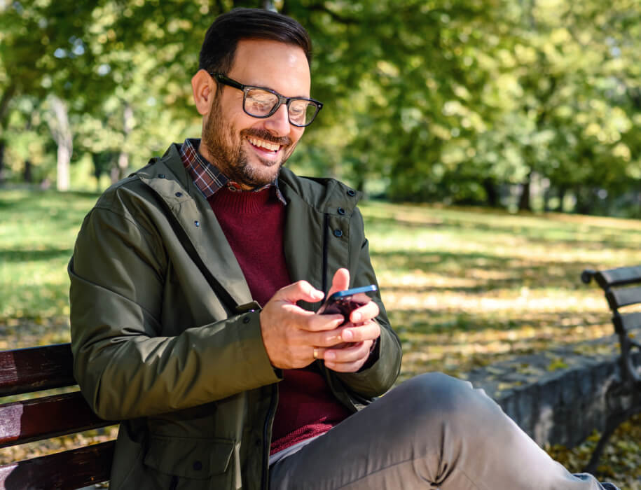 man looking at a smartphone